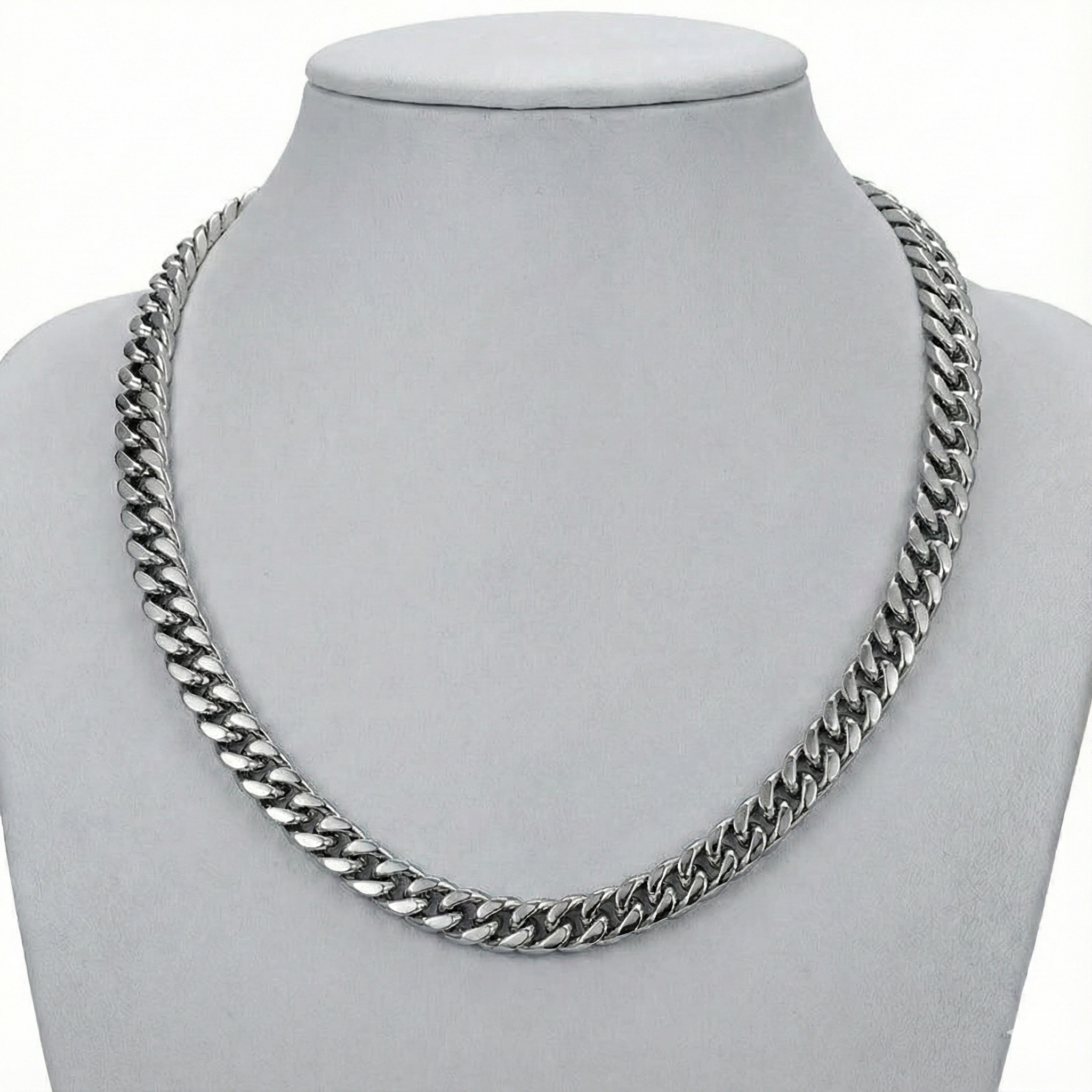 Cuban link stainless steel chain on bust display – The Crew
