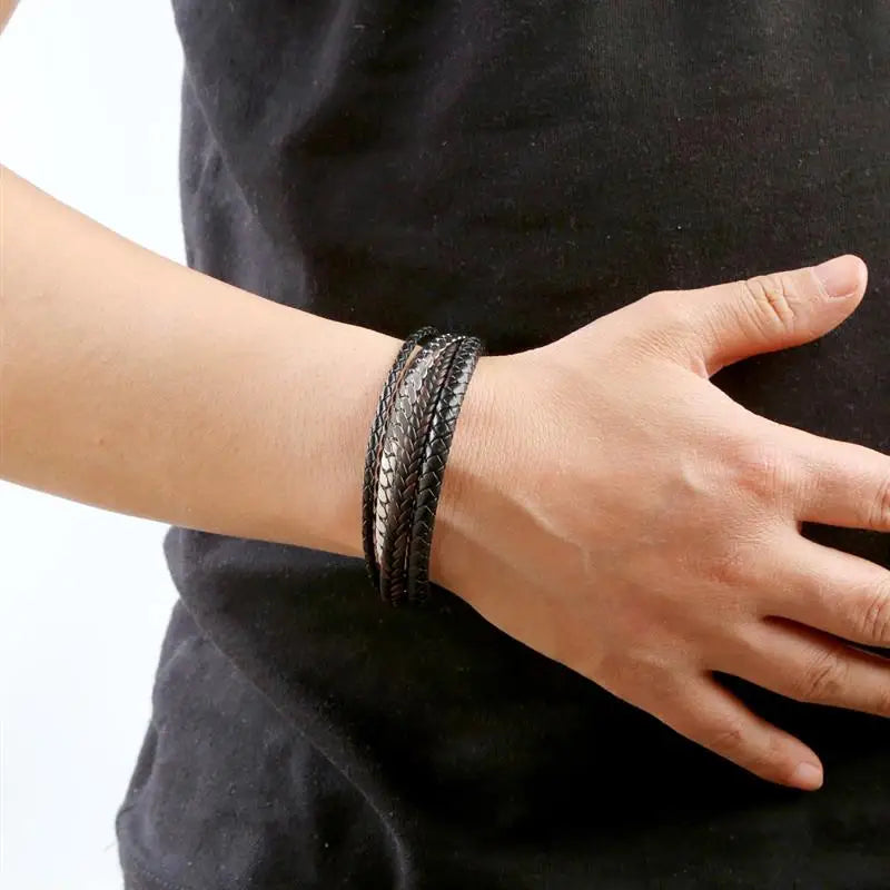 Men wearing braided leather bracelet front – The Crew