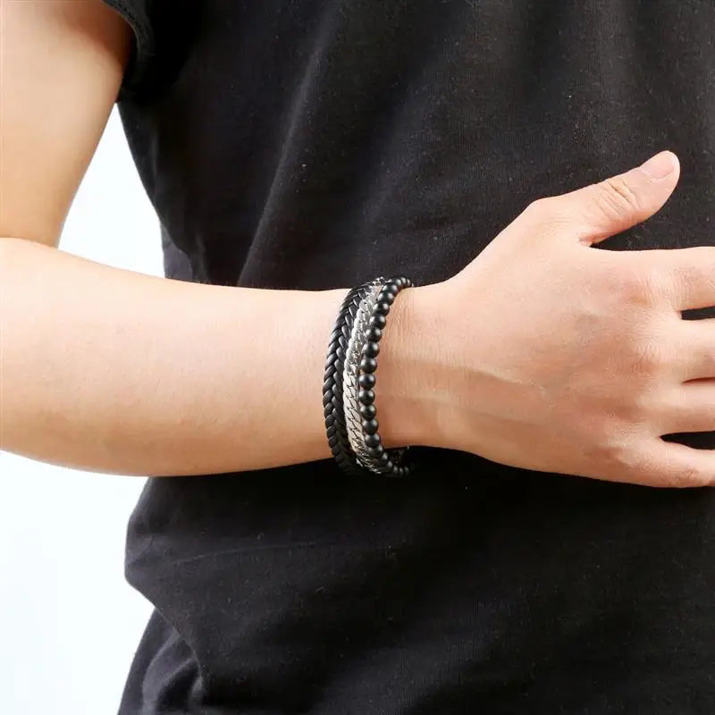 Men wearing braided leather bracelet hand pose – The Crew