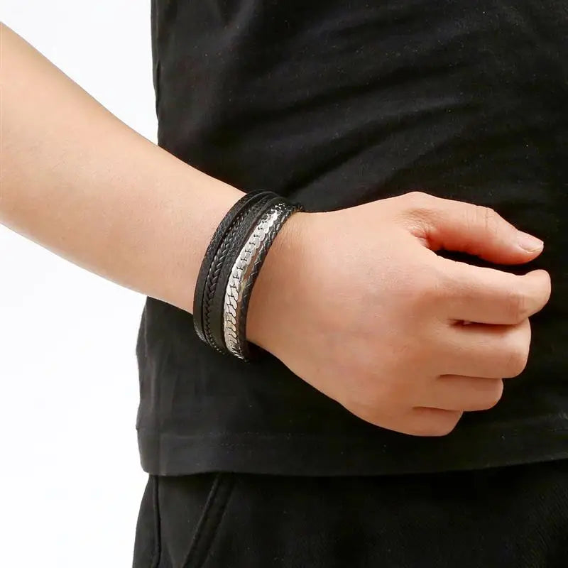 Men wearing braided leather bracelet front – The Crew