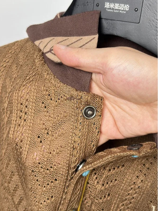 Close-up view of the clean internal stitching and premium pattern construction on the polo's contrast lapel collar