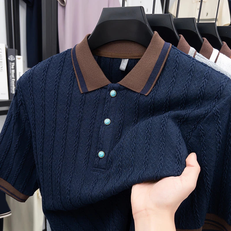 Close-up shot of the premium soft comfort jacquard knit pattern and contrast buttons on the grey polo shirt