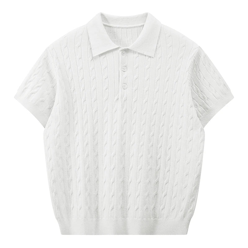 Front view of an optical white men's short-sleeve cable knit polo shirt with clear or white buttons against a white background