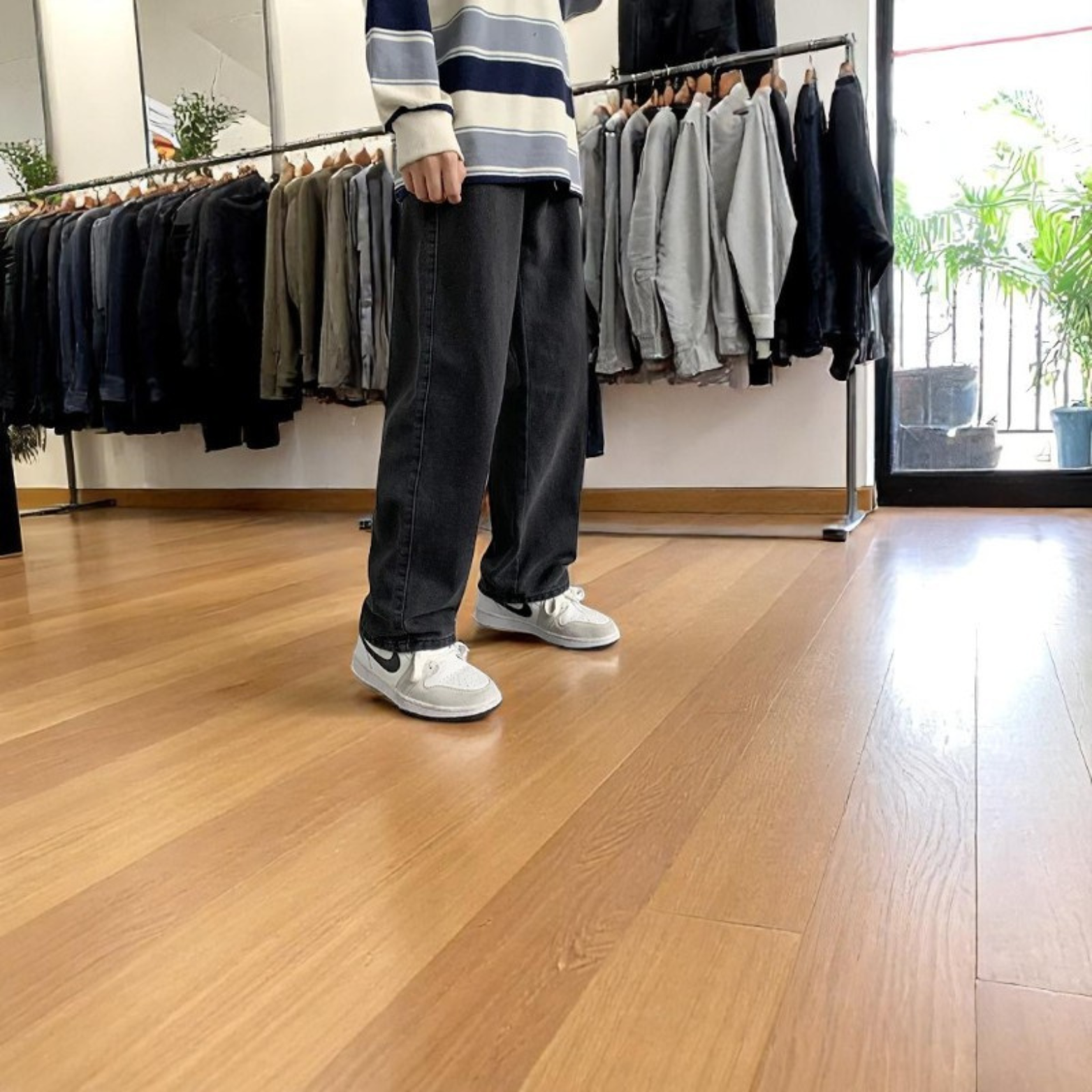 Men wide leg jeans indoor lifestyle outfit – The Crew