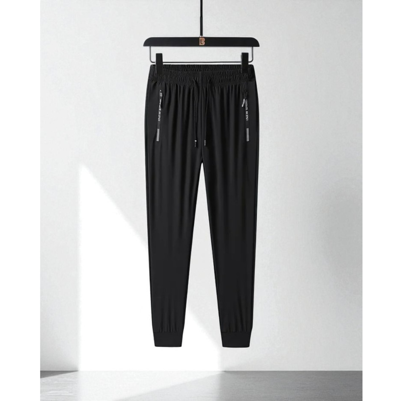 Black Ice Silk Joggers Studio Shot – The Crew