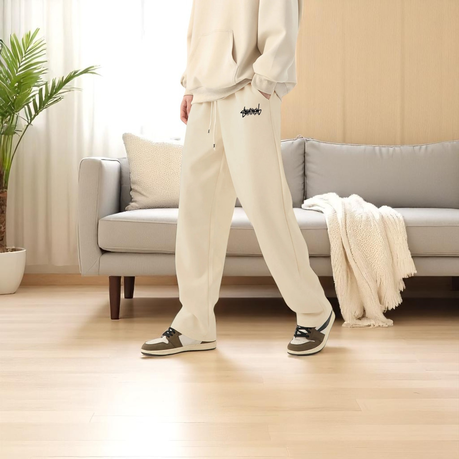 Men baggy joggers indoor lifestyle scene – The Crew