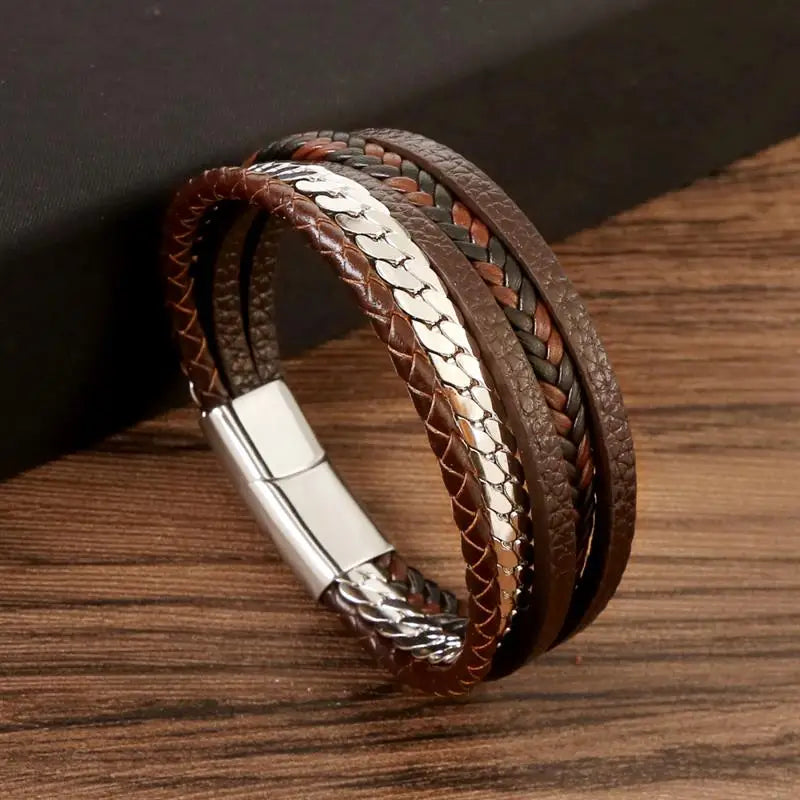 Brown  leather bracelet on wooden surface – The Crew