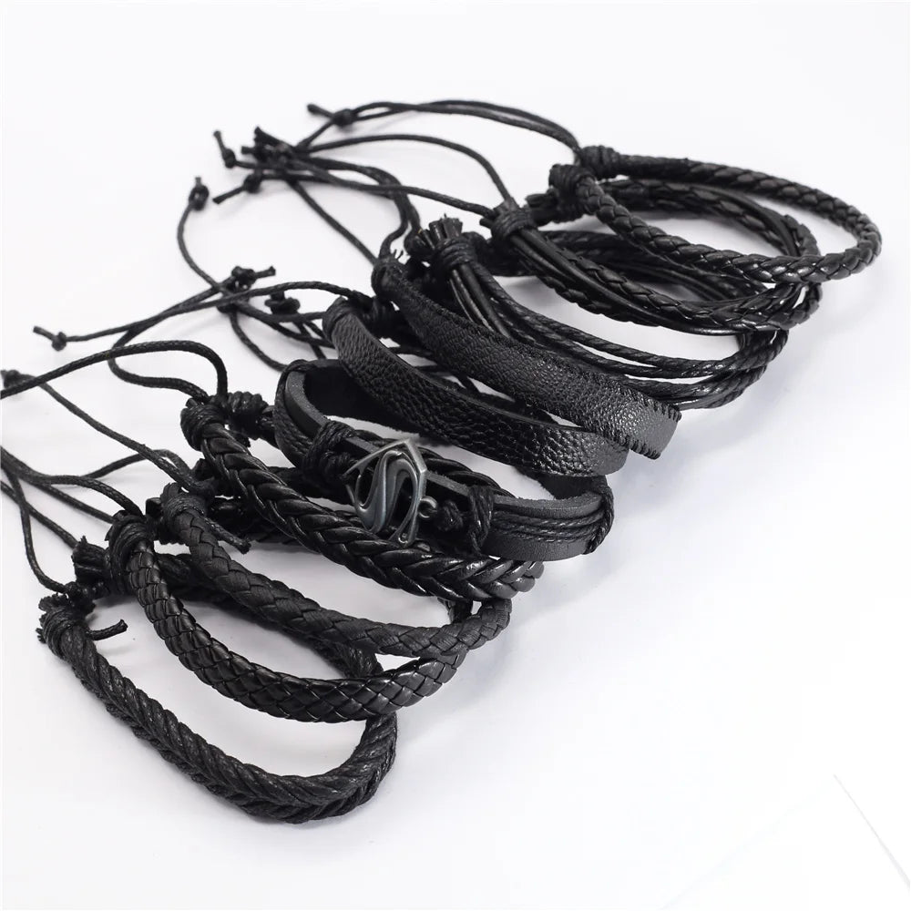 Black leather bracelet bundle flat lay – The Crew
