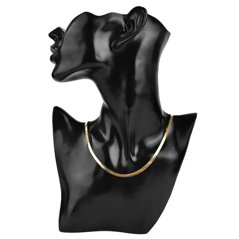 Gold snake chain necklace worn by model – The Crew