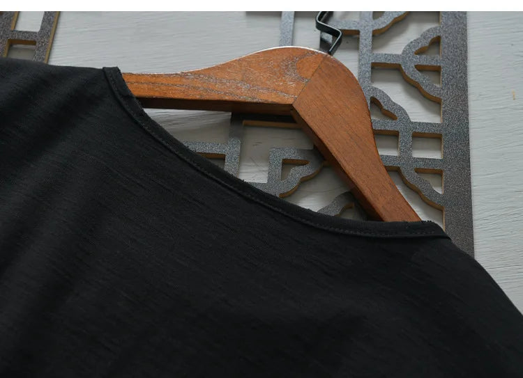 Black long sleeve cotton T-shirt folded – The Crew