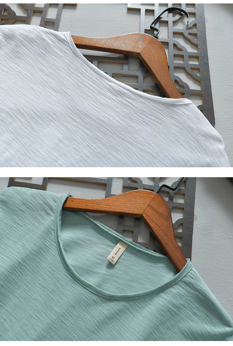 White cotton long sleeve T-shirt folded – The Crew