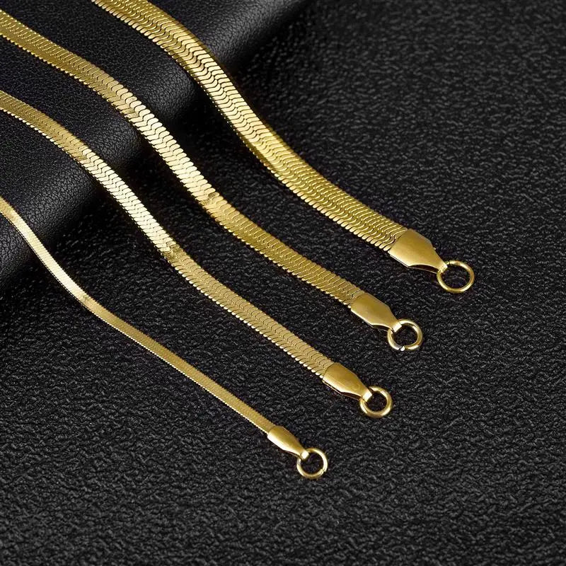 Silver snake chain necklace close-up – The Crew