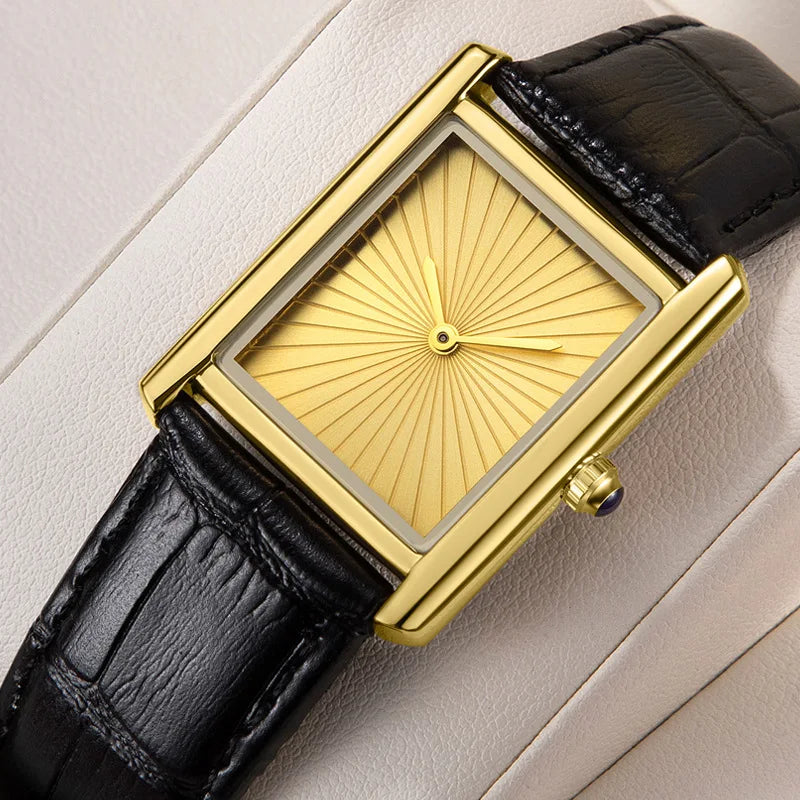 Close-up shot of a ZBJP gold square watch with a matching gold sunray dial, blue cabochon gem crown, and premium leather strap