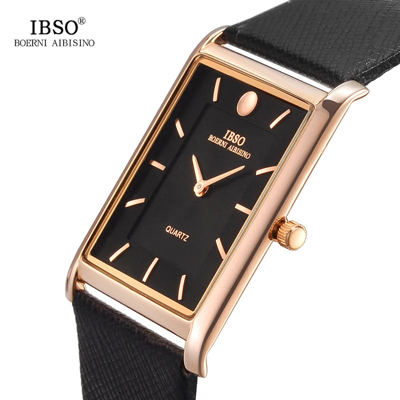 Studio product shot of an IBSO rectangular dress watch with a luxury gold-plated finish, minimalist black dial, and a black strap