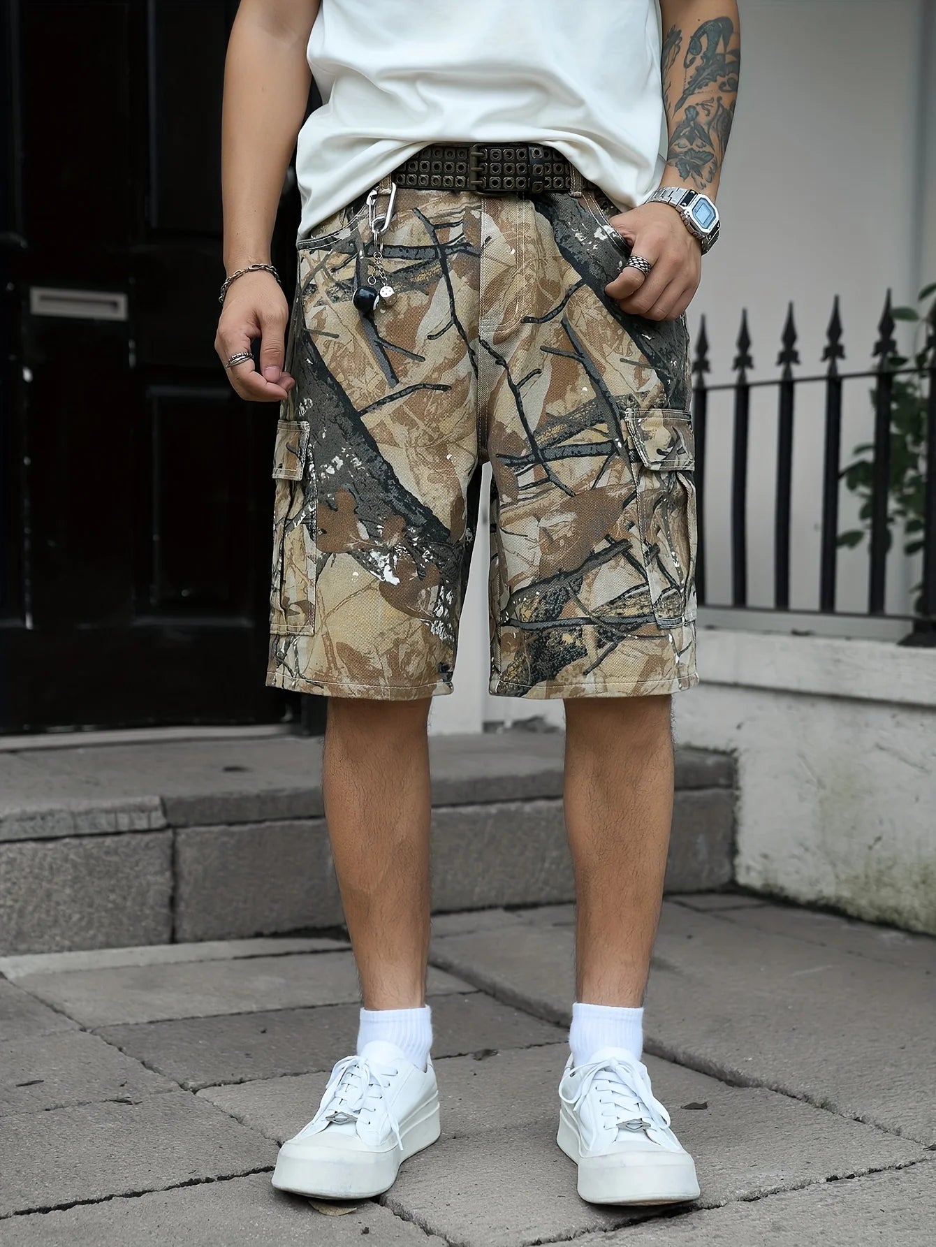 Front view of men's slim fit camo cargo shorts showcasing the knee-length tactical hunting pattern