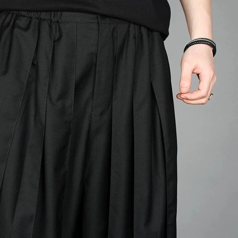 Close-up shot of the high-quality front pleats and flexible drawstring waistband construction