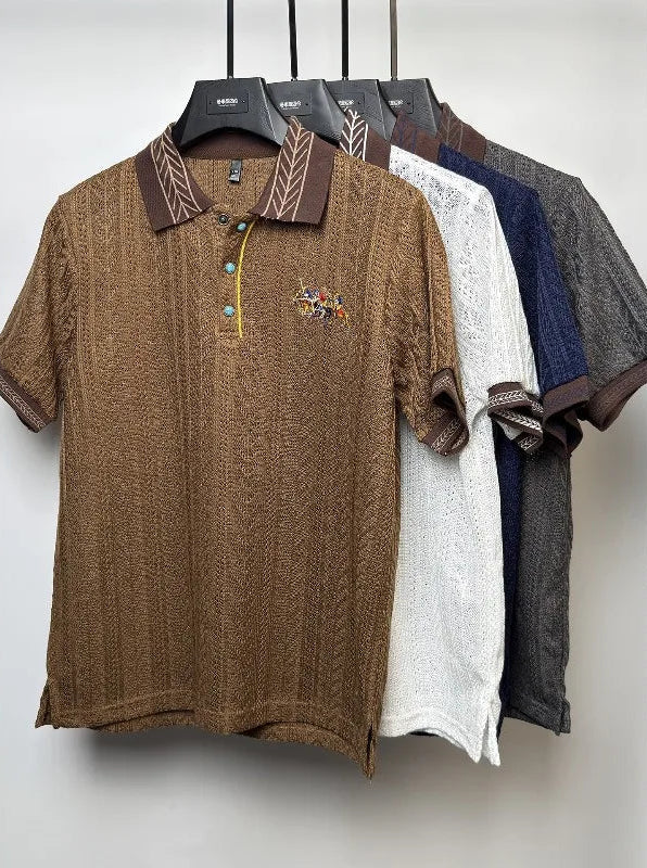 Boutique clothing rack display showcasing the full summer collection of men's luxury embroidered jacquard polo shirts
