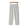Front studio view of men's lightweight pleated ice silk trousers in heather grey on a wooden hanger