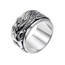 Wide men's silver spinner ring featuring a detailed 3D oxidized Chinese dragon design on a white background.