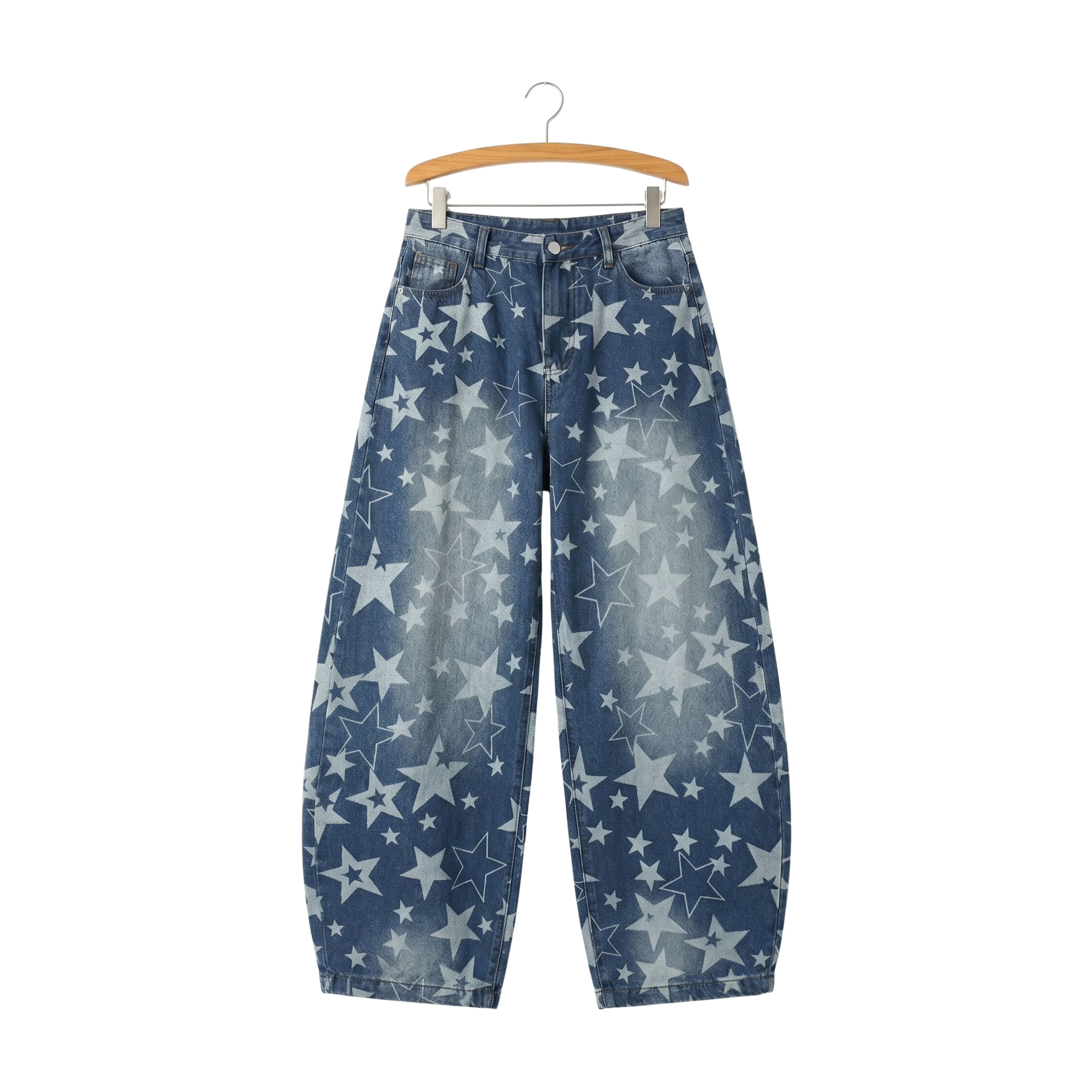 Blue baggy denim pants covered in an all-over vintage star pattern print, perfect for Y2K high-street streetwear fashion